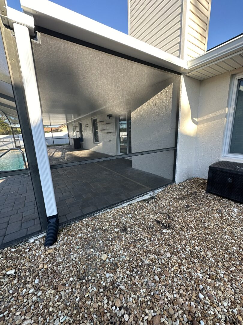 back porch screen enclosure at a home in Hudson Florida